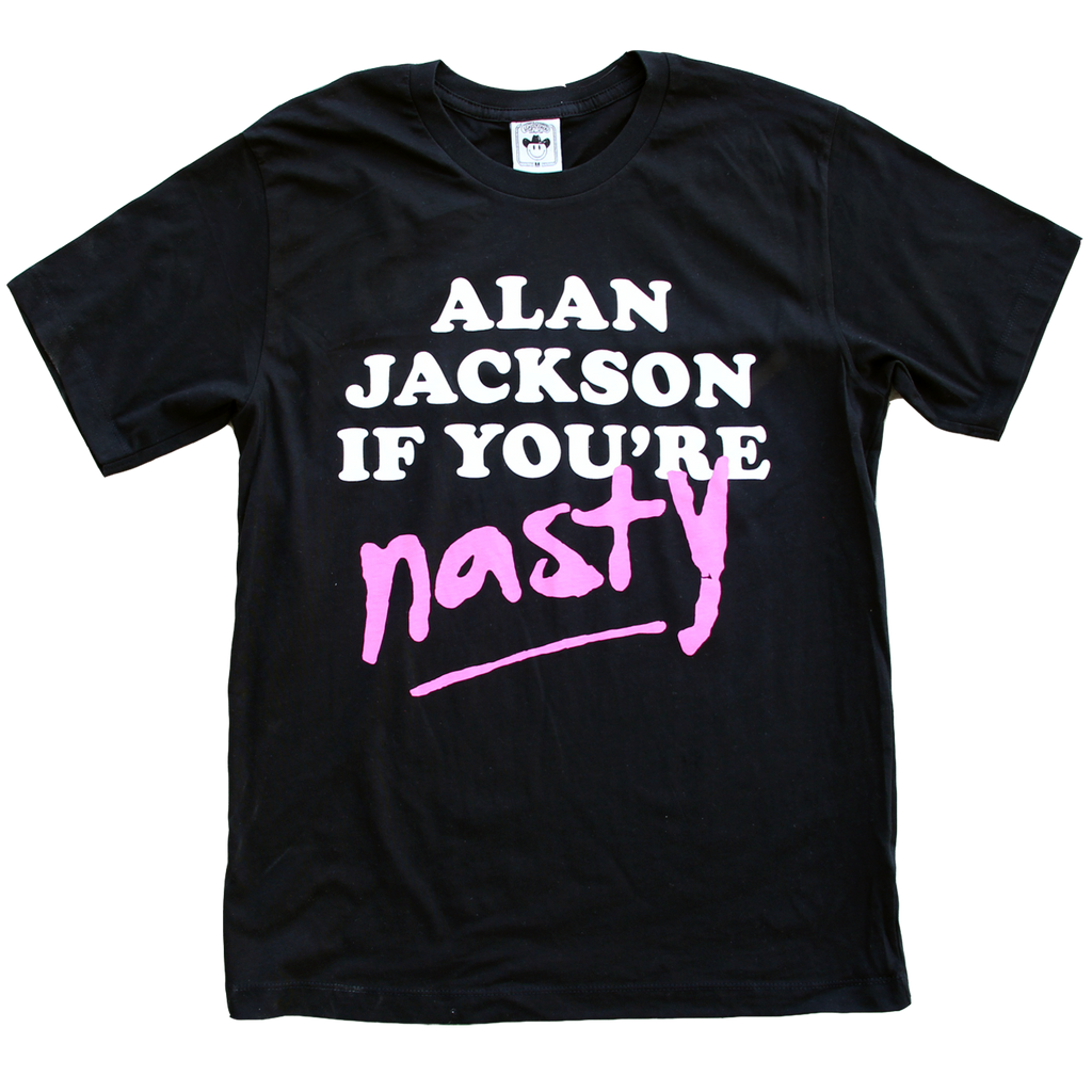 "Mister Jackson If Ur Nasty" by Vinyl Ranch features a white & pink graphic printed on a classic black tee.