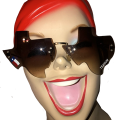 "Texsunglasses" by Vinyl Ranch are a classic aviator style pair of sunglasses cut into the shape of the Lone Star State, and featuring two custom Vinyl Ranch stickers on the lenses. Total Dimensions: 5" x 2.75" x 6.5".