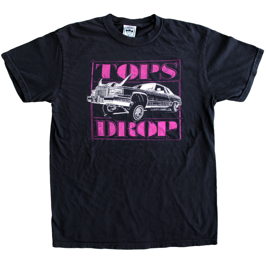 "Tops Drop" is printed with purple ink on a classic black tee by Vinyl Ranch. Check out the full Rodeo Screwston Collection