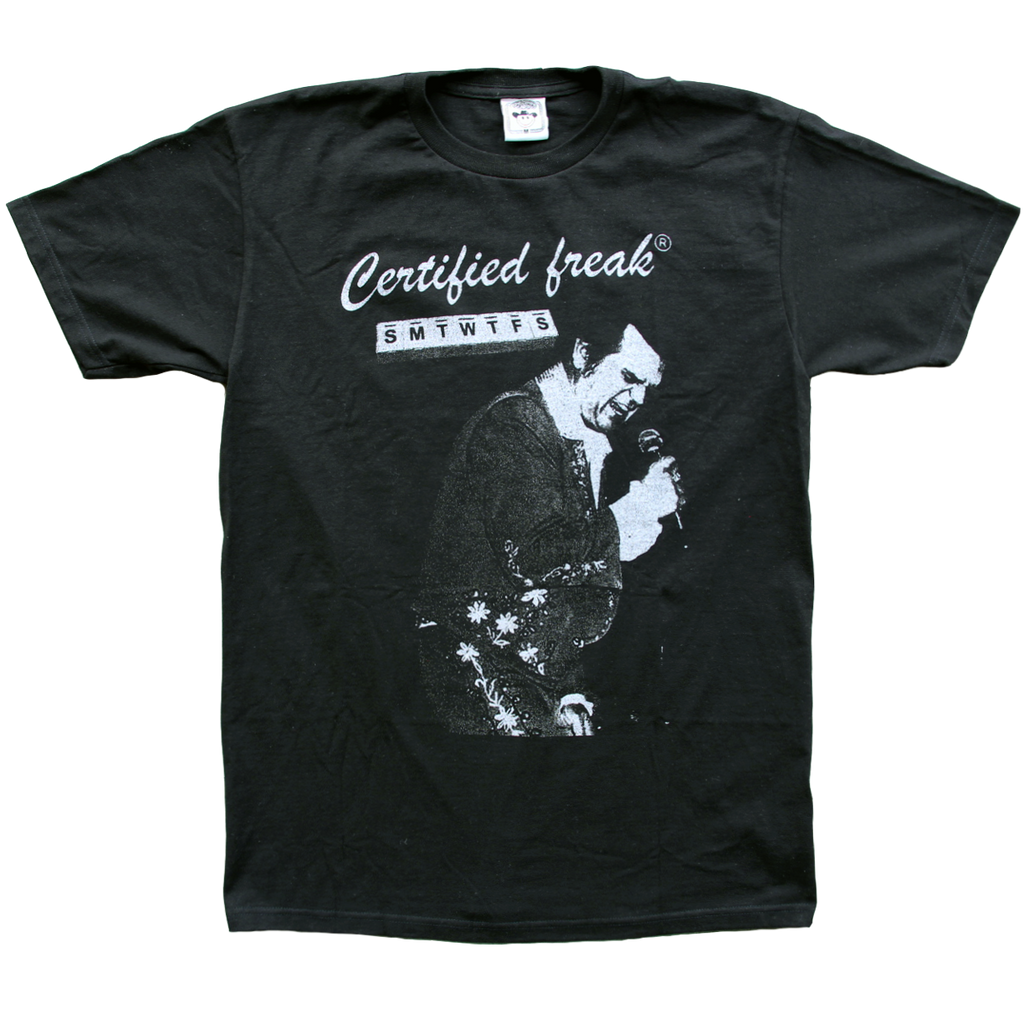 "Certified Freak" features a metallic silver graphic printed on a classic black tee by Vinyl Ranch.