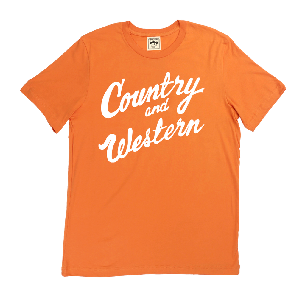 The iconic "Country & Western" orange t-shirt by Vinyl Ranch.  Check out the full Country & Western Collection