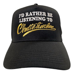 "I'd Rather Be Listening To Chattahoochee" features a white & metallic gold embroidered design by Vinyl Ranch. Printed on a traditional black snapback.