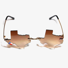 "Texsunglasses" by Vinyl Ranch are a classic aviator style pair of sunglasses cut into the shape of the Lone Star State, and featuring two custom Vinyl Ranch stickers on the lenses. Total Dimensions: 5" x 2.75" x 6.5".