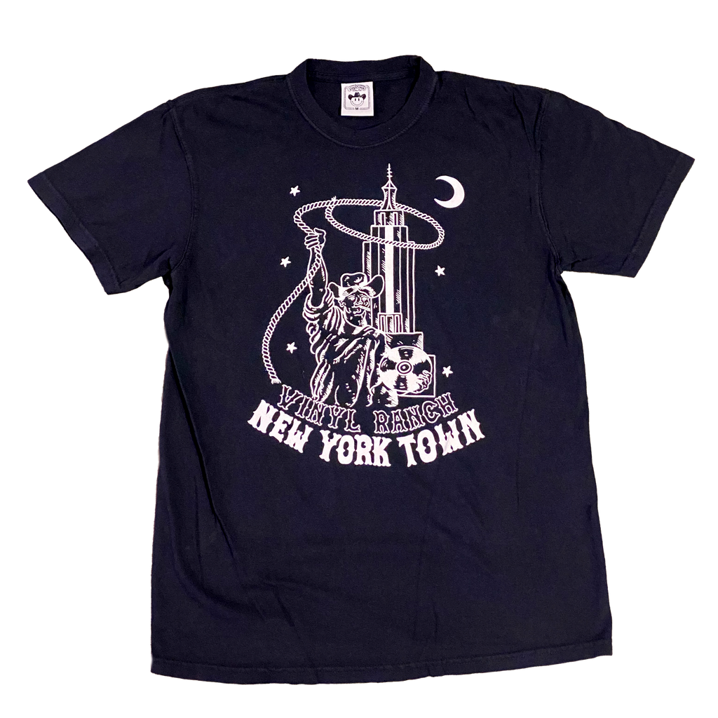 "New York Town" by Vinyl Ranch is our official show merch from August 2021 printed on a classic black tee. Illustration by Taylor Rushing.