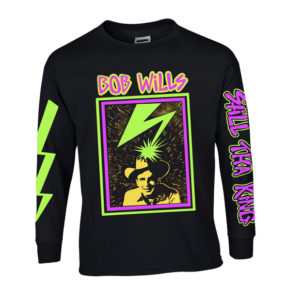 "Still Tha King Neon" by Vinyl Ranch is an homage to Bob Wills in a limited edition colorway. 4 color design with full sleeve prints and printed on a classic black longsleeve tee.