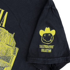 "Teen Spirit" by Vinyl Ranch is part of the Yallternative Collection, featuring a yellow design printed on a classic black tee.