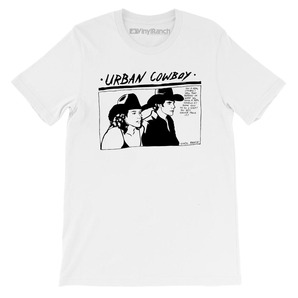 "Urban Cowboy" is a design inspired by the classic film, printed in black ink on a classic white tee by Vinyl Ranch. "You a real cowboy?"