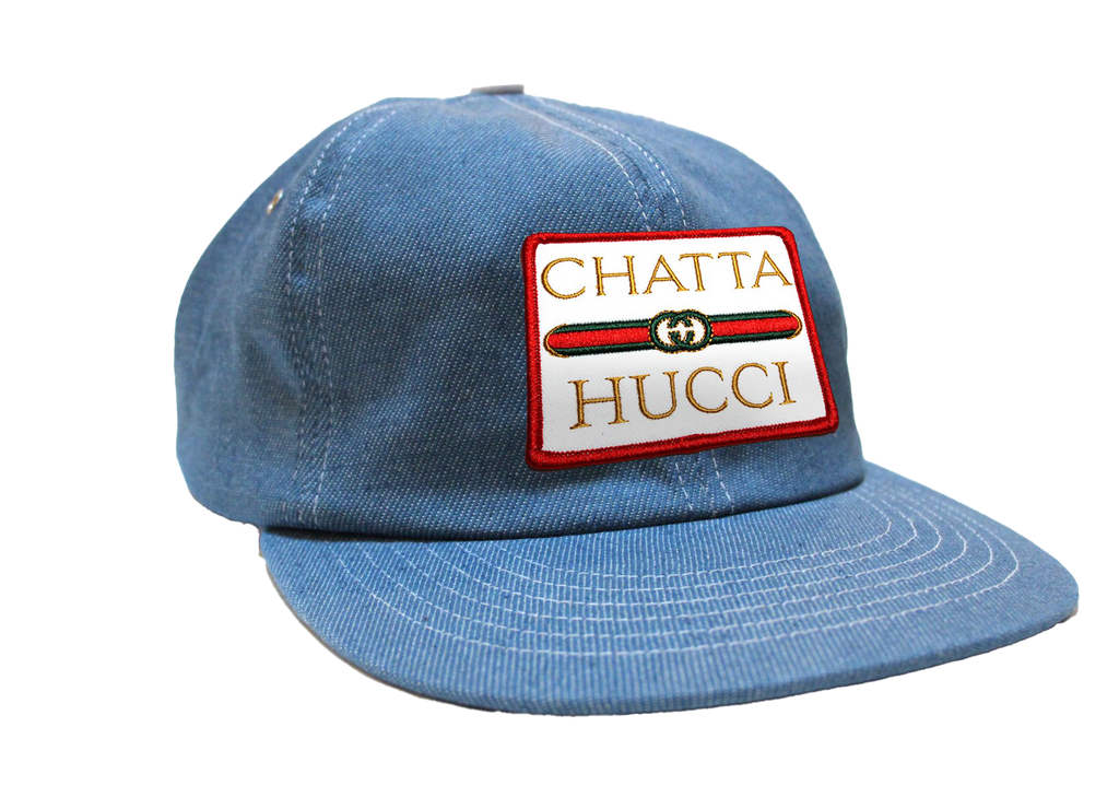 The classic "Chattahucci Chambray Patch Cap" featuring a white snapback and large patch by Vinyl Ranch. Check out the full Chattahucci Collection