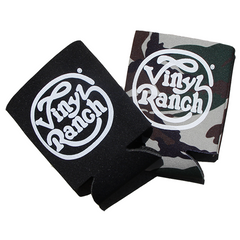 "Vinyl Ranch Camo Koozie Pack" is a set of 2 classic koozies featuring the Vinyl Ranch logo. Includes 1 black koozie, and 1 camo print koozie.