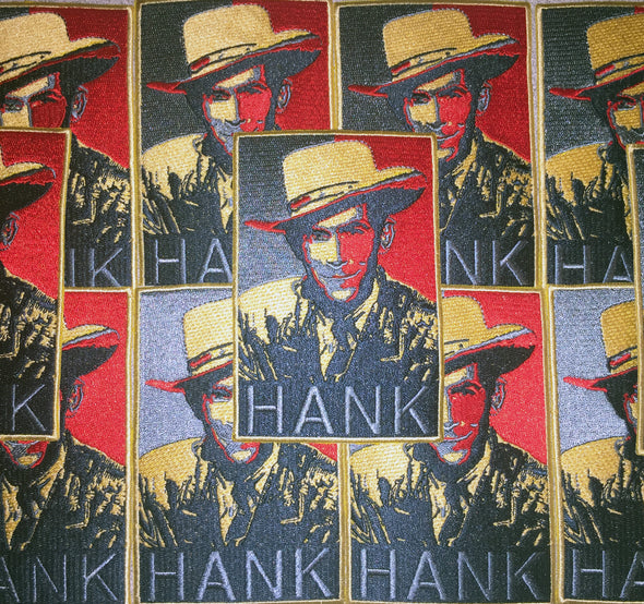 "Hank Jumbo Patch" is a high quality, jumbo iron-on patch by Vinyl Ranch. Designed in Shepard Fairey style in baby blue, navy, red, and cream. 4.25" X 3".