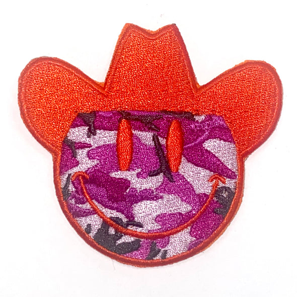 A high quality 3" x 3" iron-on patch in purple & orange camo by Vinyl Ranch.