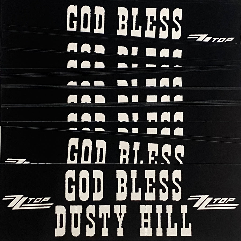 "God Bless Dusty Hill" is a black sticker with white lettering by Vinyl Ranch. Traditional bumper sticker size. 8.5" X 2.75".