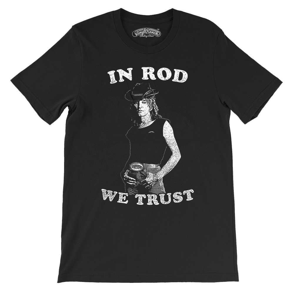 "In Rod We Trust" is a vintage-style design by Vinyl Ranch. Printed in white on a classic black tee.