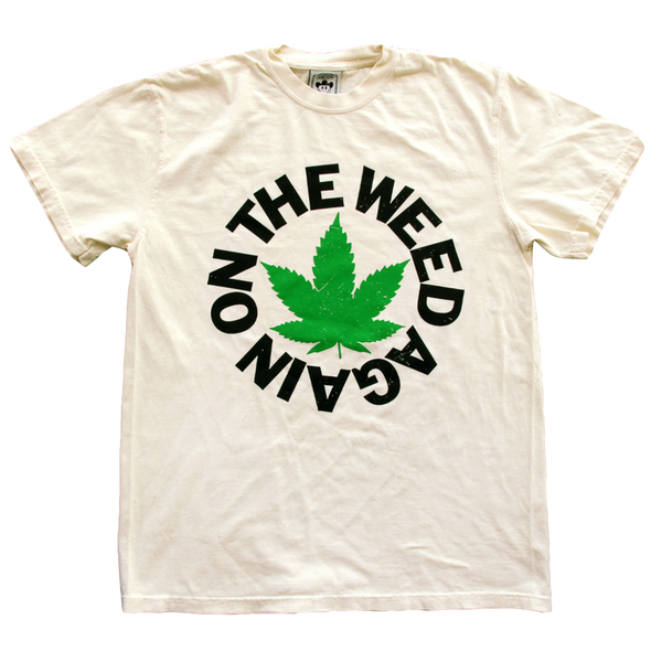 "On The Weed Again" by Vinyl Ranch is a 2 color design printed on a classic cream unisex tee.